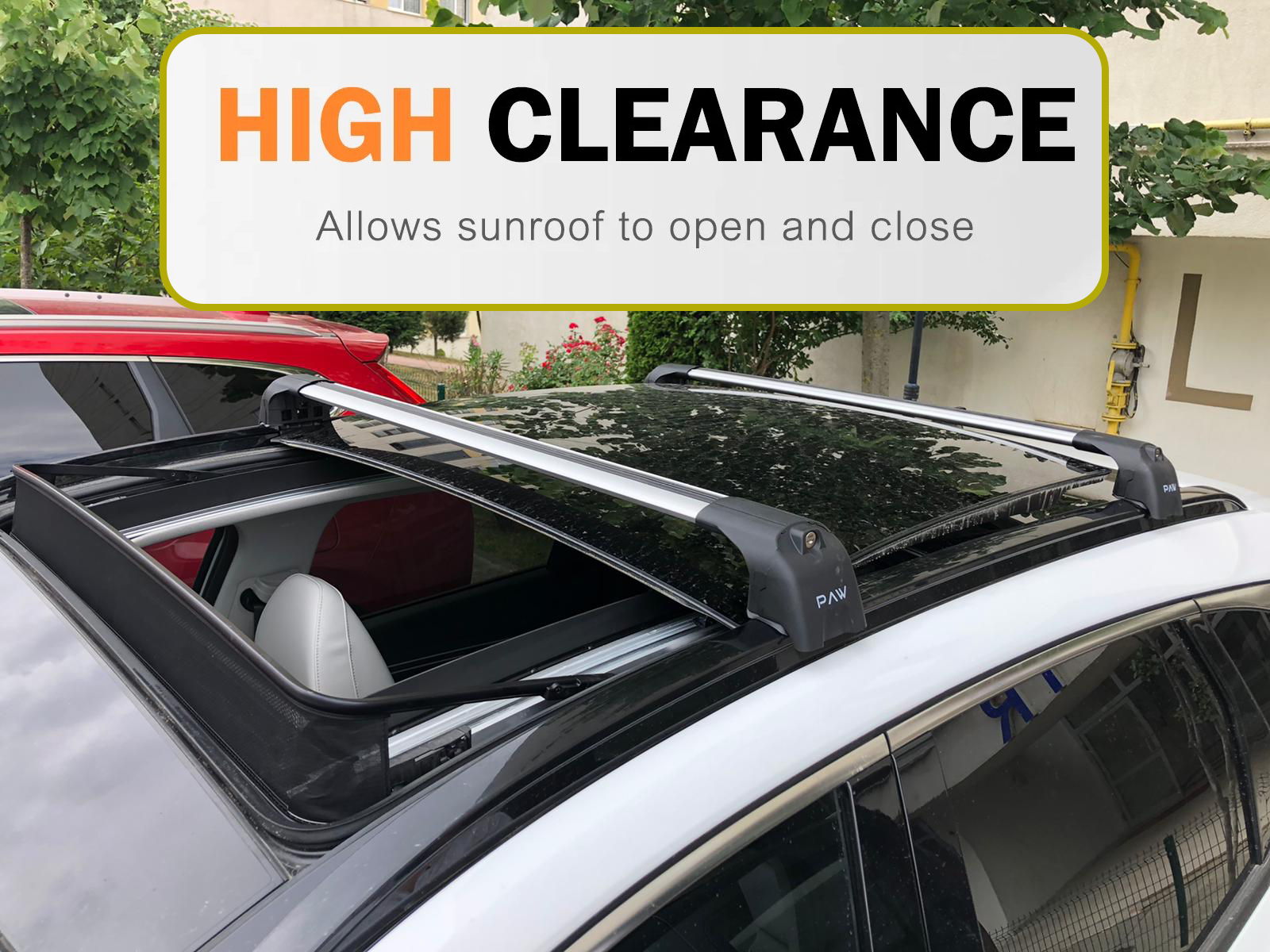 Car with roof rack system and 'High Clearance' label on a vehicle background Car with roof rack system and 'High Clearance' label on a vehicle background